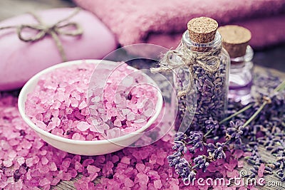 Sea salt, dry lavender, essential oil and lavender flowers Stock Photo