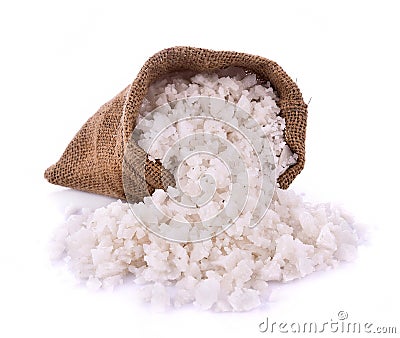 Sea salt in jute sack on white background Stock Photo