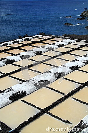 Sea salt production Stock Photo