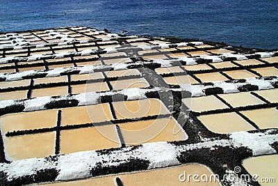 Sea salt production Stock Photo