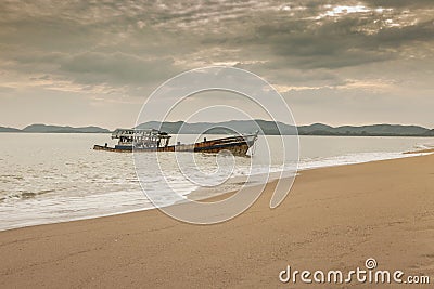 Sea scape of wrech on sand beach Stock Photo