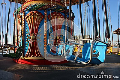 Sea Swings amusement park ride on Boardwalk in California Stock Photo