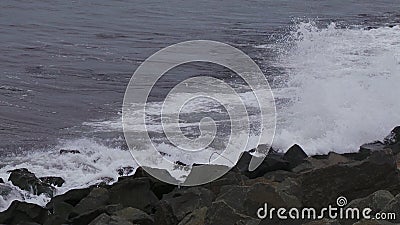 Sea thrashing the rocks in Hartlepool Stock Photo