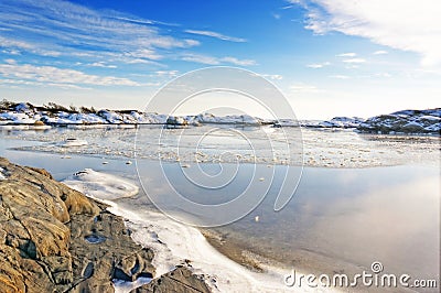 Sea tide at bay fjord visible in winter Stock Photo