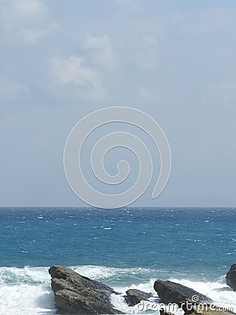When the sea tide rises, strong and powerful blue waves advance to the coast at Hualien ,Taiwan. Stock Photo