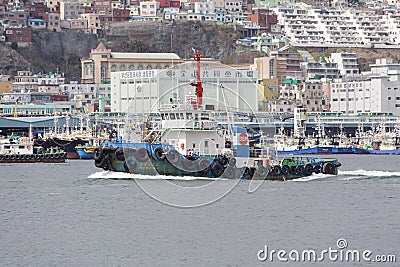 Sea tow on the against other courts and city structures Editorial Stock Photo