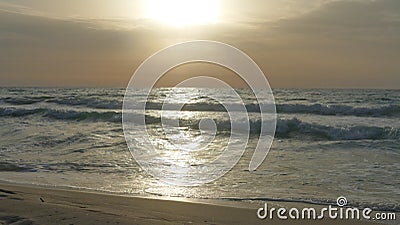 The sea under the rising sun Stock Photo