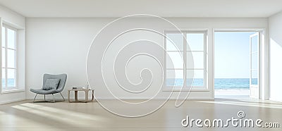 Sea view living room with empty wall in modern beach house, Luxury white interior of summer home Stock Photo