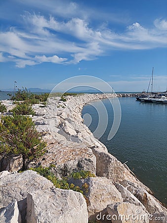 Yachts on horizon in the marina Stock Photo