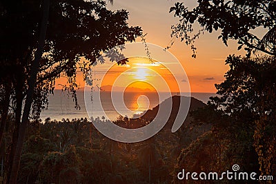 Sea view from the mountain overlooking the boat and coconut tree Stock Photo