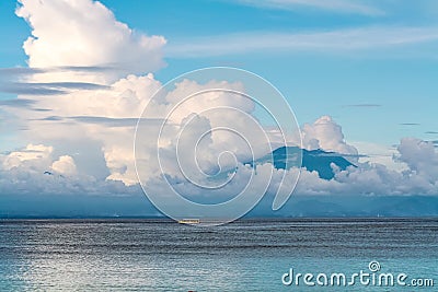 Sea view mountains with clouds at sunset Stock Photo