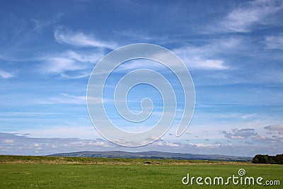 Sea wall, countryside view distant hills Lancashire Stock Photo