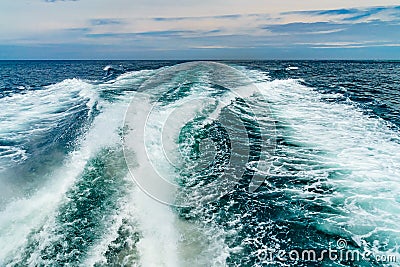 Sea water foam Ship track in the ocean Water texture. Ocean view Marine travel Cape cod Massachusetts Stock Photo