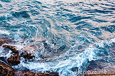 Sea water hits stone beach, wave and beach, nature background concept Stock Photo