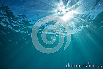 Sea water surface with sun on background Stock Photo