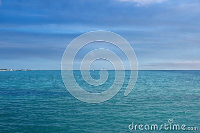 Sea water texture background. Ocean surface aerial view. Shining blue water ripple background. Summer concept. Stock Photo
