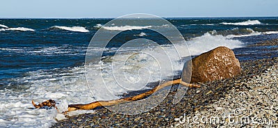 Sea waves lapping on the shore Baltic Sea Stock Photo