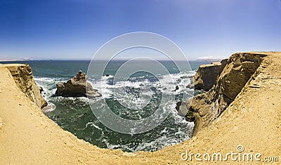 Sea waves on shore of pacific ocean with rocks Stock Photo