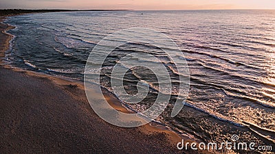 Sea waves at sunset on the Baltic Sea Stock Photo