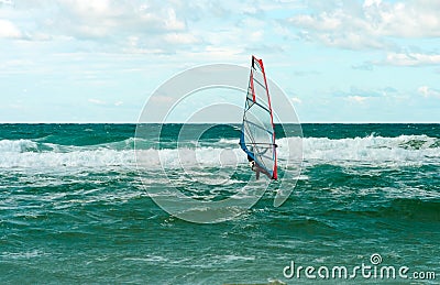 Sea Windsurfing Sport sailing water active leisure Windsurfer training Stock Photo