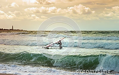 Sea Windsurfing Sport sailing water active leisure Windsurfer training Stock Photo