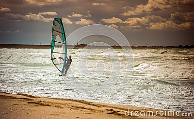 Sea Windsurfing Sport sailing water active leisure Windsurfer training Stock Photo