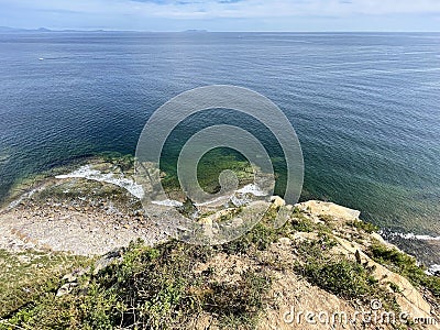 The seabed through the clear water off the coast of the Russian island. Akhlestysheva Bay Stock Photo