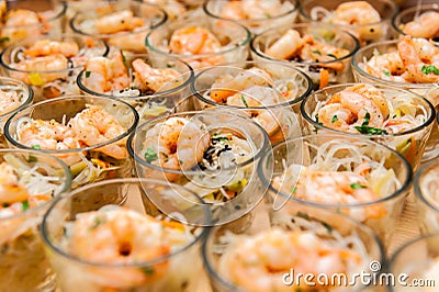 Seafood appetizers in small glasses Stock Photo