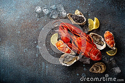 Seafood assorted with lobster, oysters, salmon tartare, black caviar top view Stock Photo