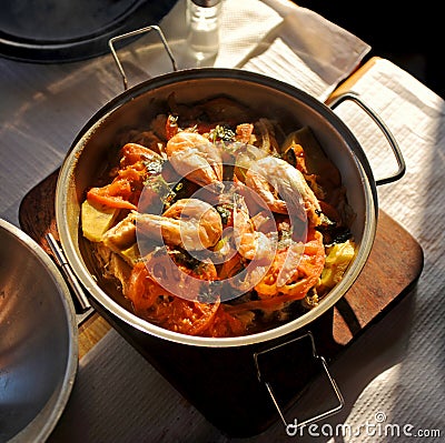 Seafood cataplana stew, traditional cuisine from the Algarve Region, Portugal Editorial Stock Photo