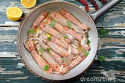 Seafood cooked mantis shrimp, or sea cicadas in metal pan Stock Photo