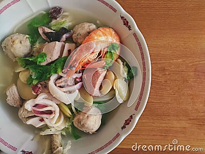 Seafood noodles in taiwanese style, with cuttlefish, shrimp, clams and mackerel. Stock Photo
