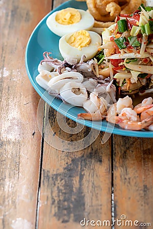 Seafood papaya salad dish Stock Photo