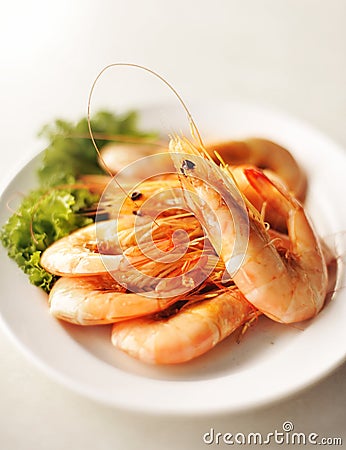 Seafood shrimp bake in white plate Stock Photo