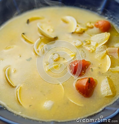 Seafood soup plate with clams and prawns Stock Photo