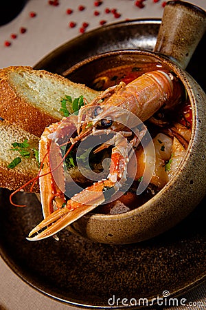 Seafood soup and toast Stock Photo