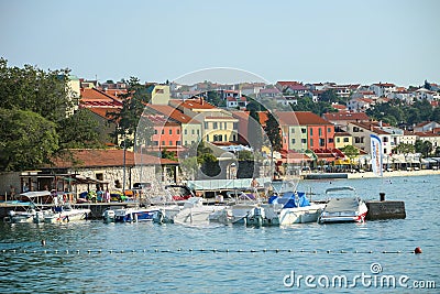 Seafront of Njivice with hotel Jadran Editorial Stock Photo