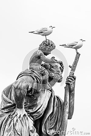 Seagulls Sitting On A Statue On Charles Bridge, Prague Stock Photo