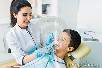 Seal installation process, pediatric dentistry Stock Photo