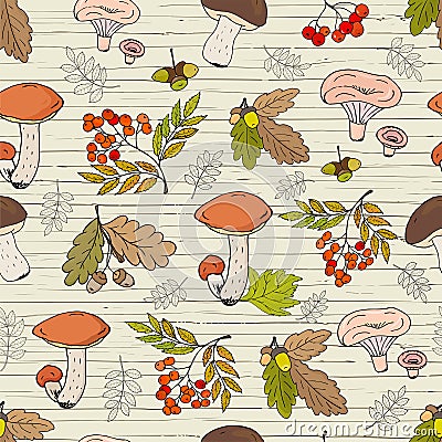 Seamless autumn background with mushrooms, acorns, leaves and rowan fruits Stock Photo