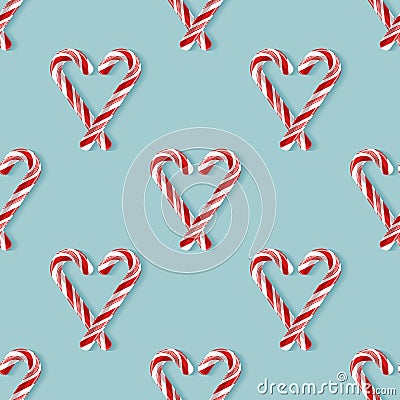 Seamless pattern with candy cane hearts Vector Illustration