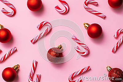 Seamless pattern from christmas candy canes and red balls, festive design paper Stock Photo