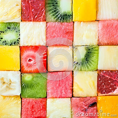 Seamless pattern of colorful fresh fruit cubes Stock Photo