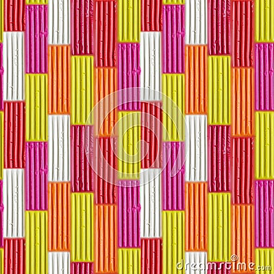 Seamless pattern of colorful plasticine sticks. Rainbow modeling clay piece for children play and creativity Stock Photo