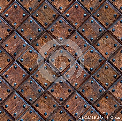 Seamless wooden panel door texture with nails Stock Photo