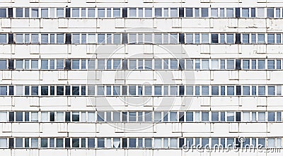 Seamlessly tilable image of a window front of a run-down building made with precast concrete slabs Stock Photo