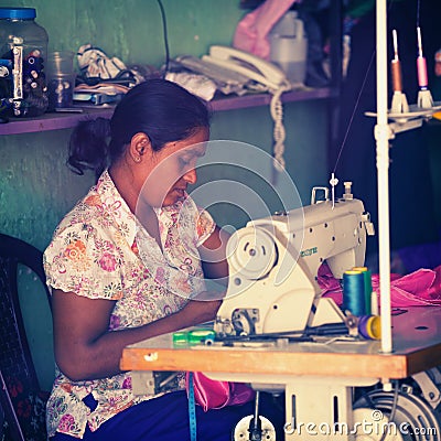 Seamstress at work Editorial Stock Photo