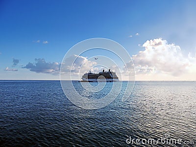 Seaplane over Cruise Ship Stock Photo