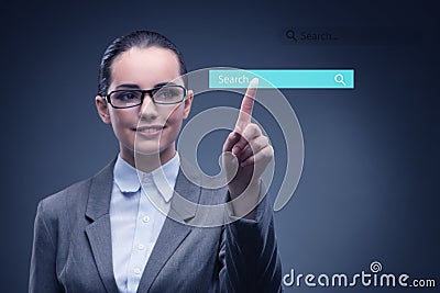 Search concept with businessman pressing button Stock Photo