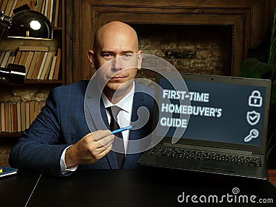 Search FIRST-TIME HOMEBUYER`S GUIDE button. Modern Broker use internet technologies Stock Photo